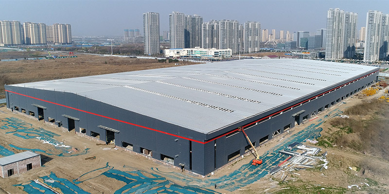 尊龙凯时人生就是搏钢结构厂房外墙施工进度跟进